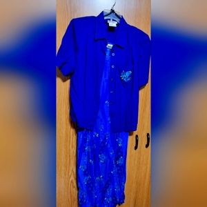 R & K 2 Piece Jacket and above the ankle dress with a slit up the side.